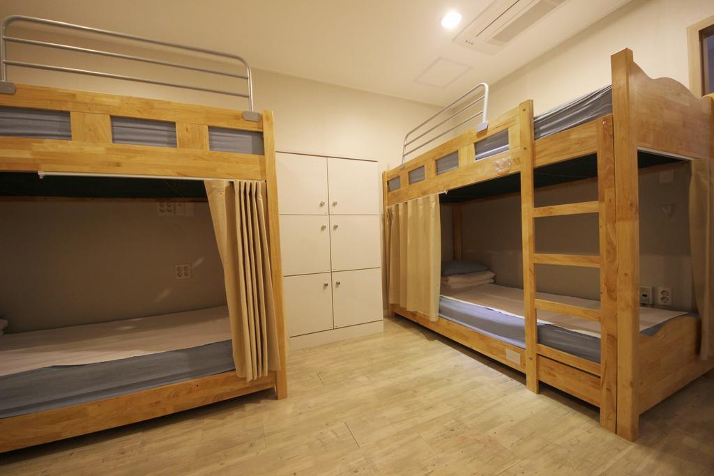 Hostel The New Day Busan Rum bild
